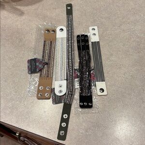 5 bling-y bracelets. 4 BNWT. 1 is a double wrap. Very cute!